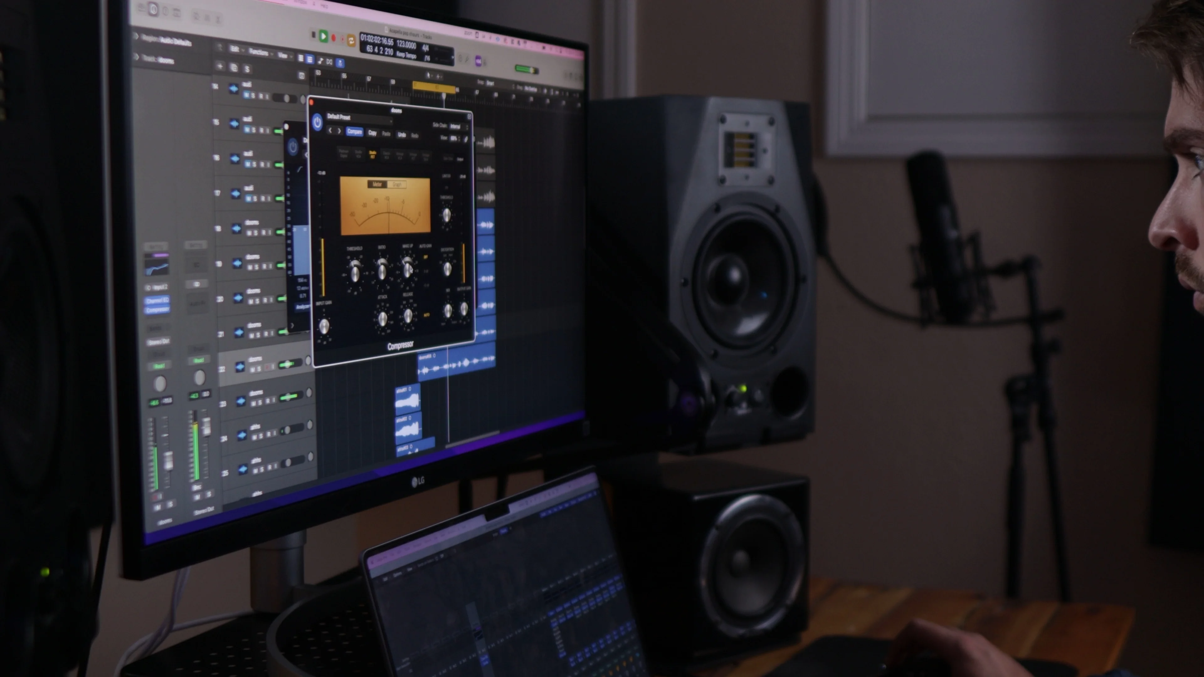 Logic Pro mastering session with vintage-style compressor plugin interface showing VU meters and compression controls for Spotify mastering
